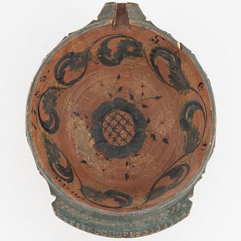 A lathed and painted bowl dated 1783.