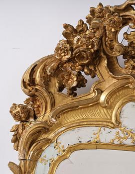 A giltwood rococo mirror, Stockholm, later part 18th century.