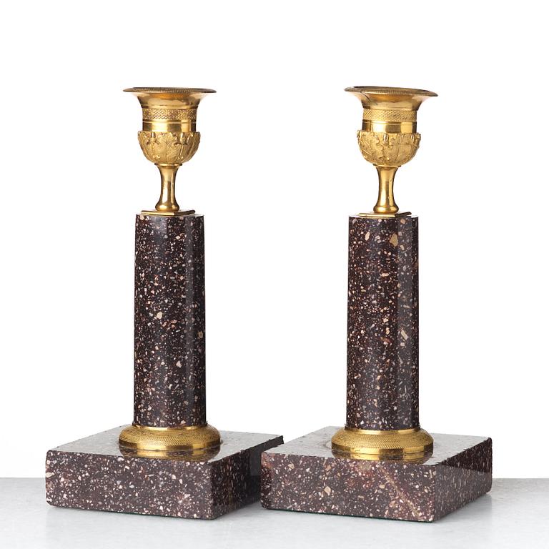 A pair of Swedish Empire candlesticks, early 19th century.