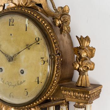 A late Gustavian wall clock by Johan Nyberg (master in Stockholm 1787-1801).