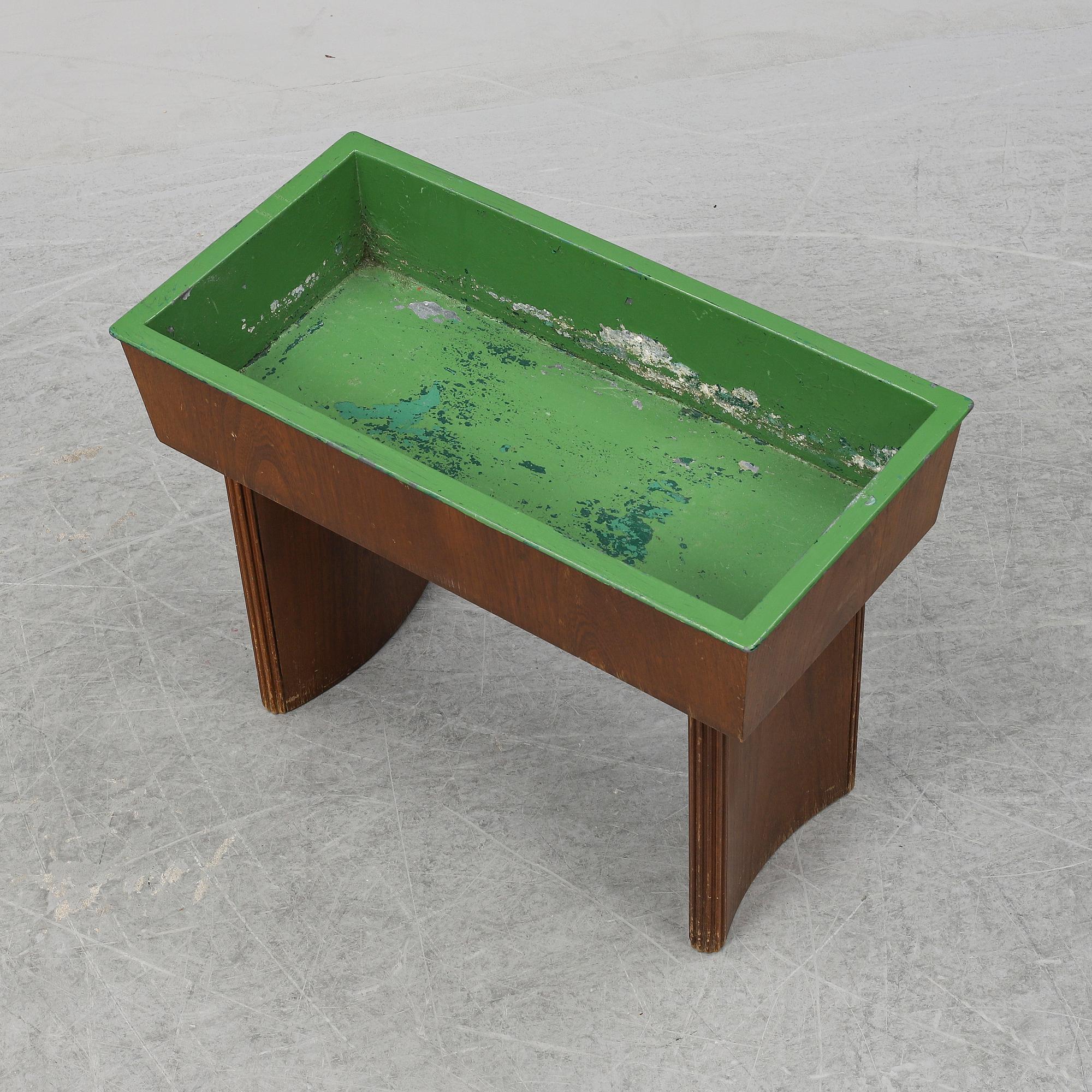 NORDISKA KOMPANIET, possibly be Carl Axel Acking, an oak plant stand from 1942.