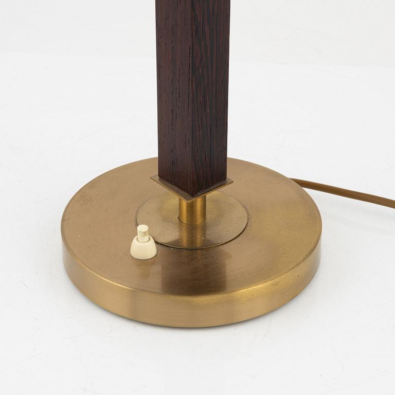 Einar Bäckström, a brass and rosewood table light, Malmö, mid 20th Century.