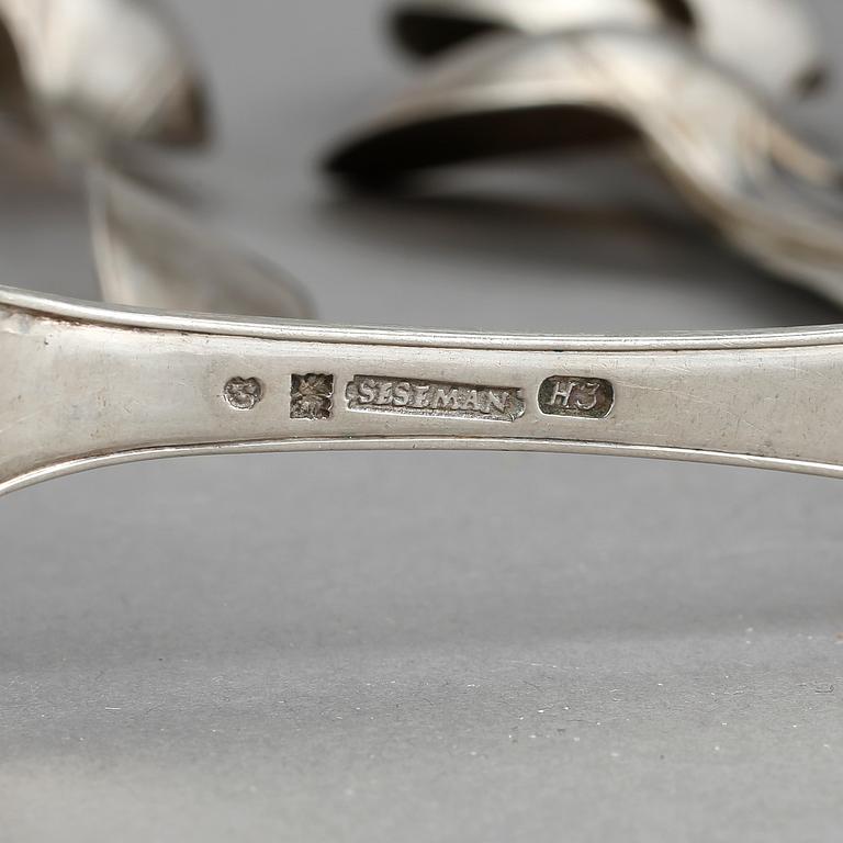 MATSKEDAR, 12 st, silver. Modell svensk spets. Bla Sesseman, Arboga, 1800-talets början. Total vikt ca 758 g.