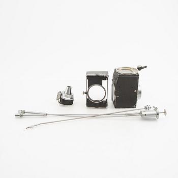 Kameror 2 st samt tillbehör Leica.