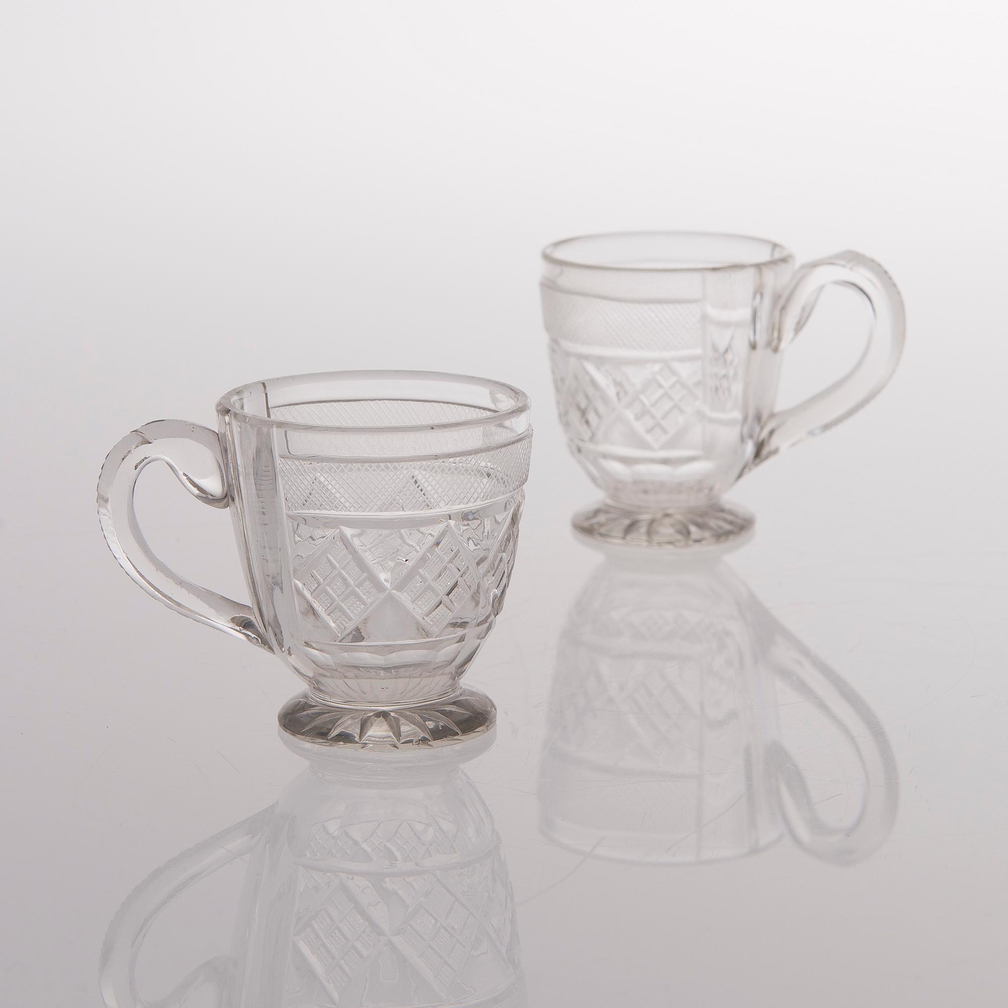 21 Russian glass punch mugs, the late 19th century.