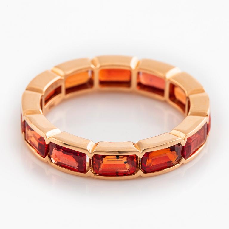 Orange sapphire ring.