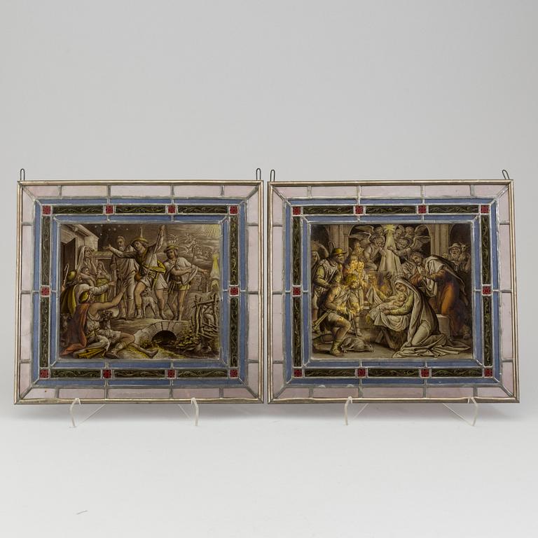 A pair of stained glass windows, circa 1900.