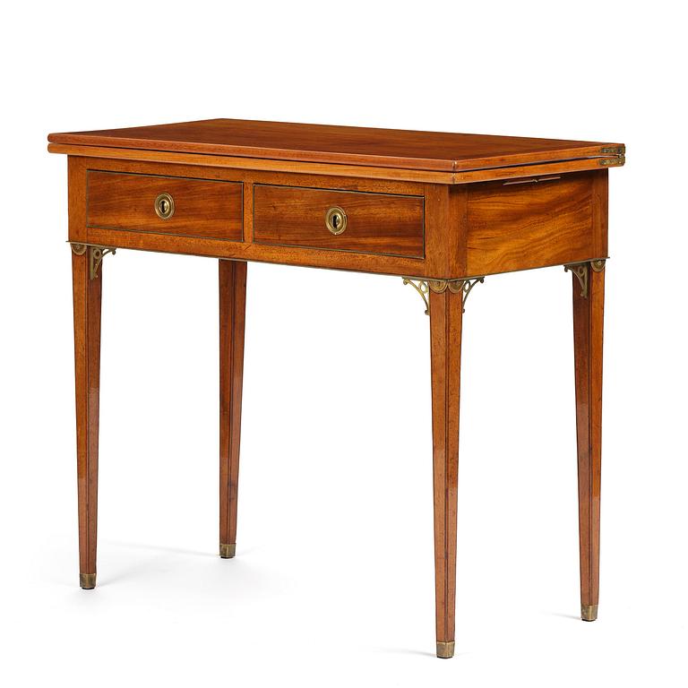 A late Gustavian mahogany games table, presumably by A. Nordström (Journeyman at G. Iwersson 1806-09).