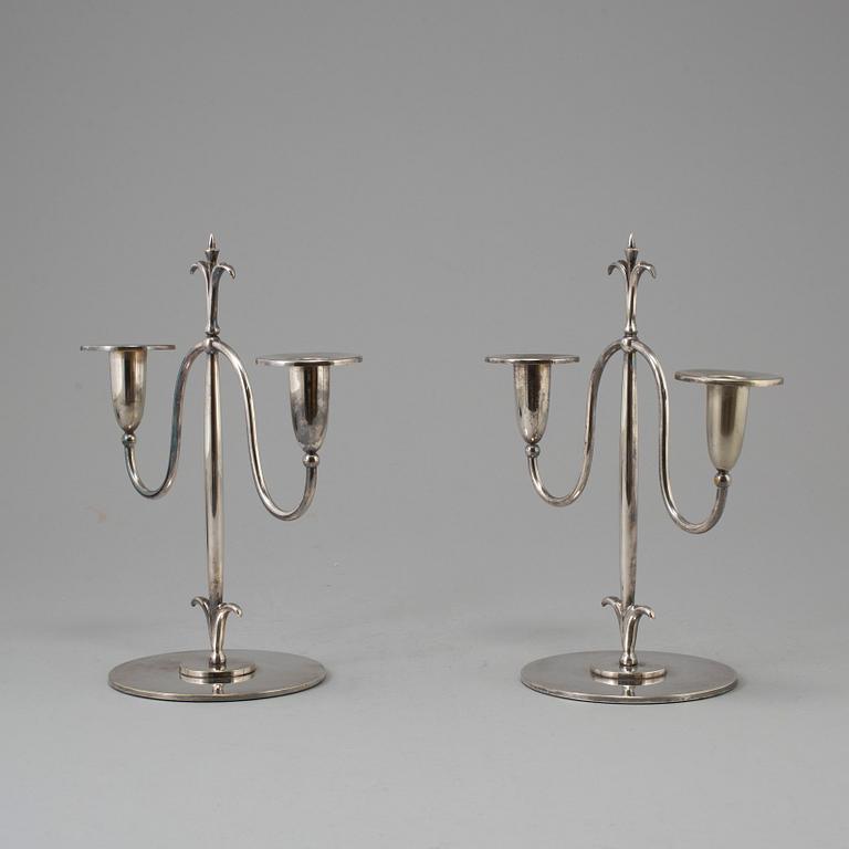 a pair of Elis Bergh silver plated candelabras, Swedish grace, CG Hallberg, Stockholm, 1920s.