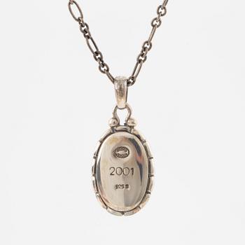 A Georg Jensen silver and cabochon-cut amber necklace.