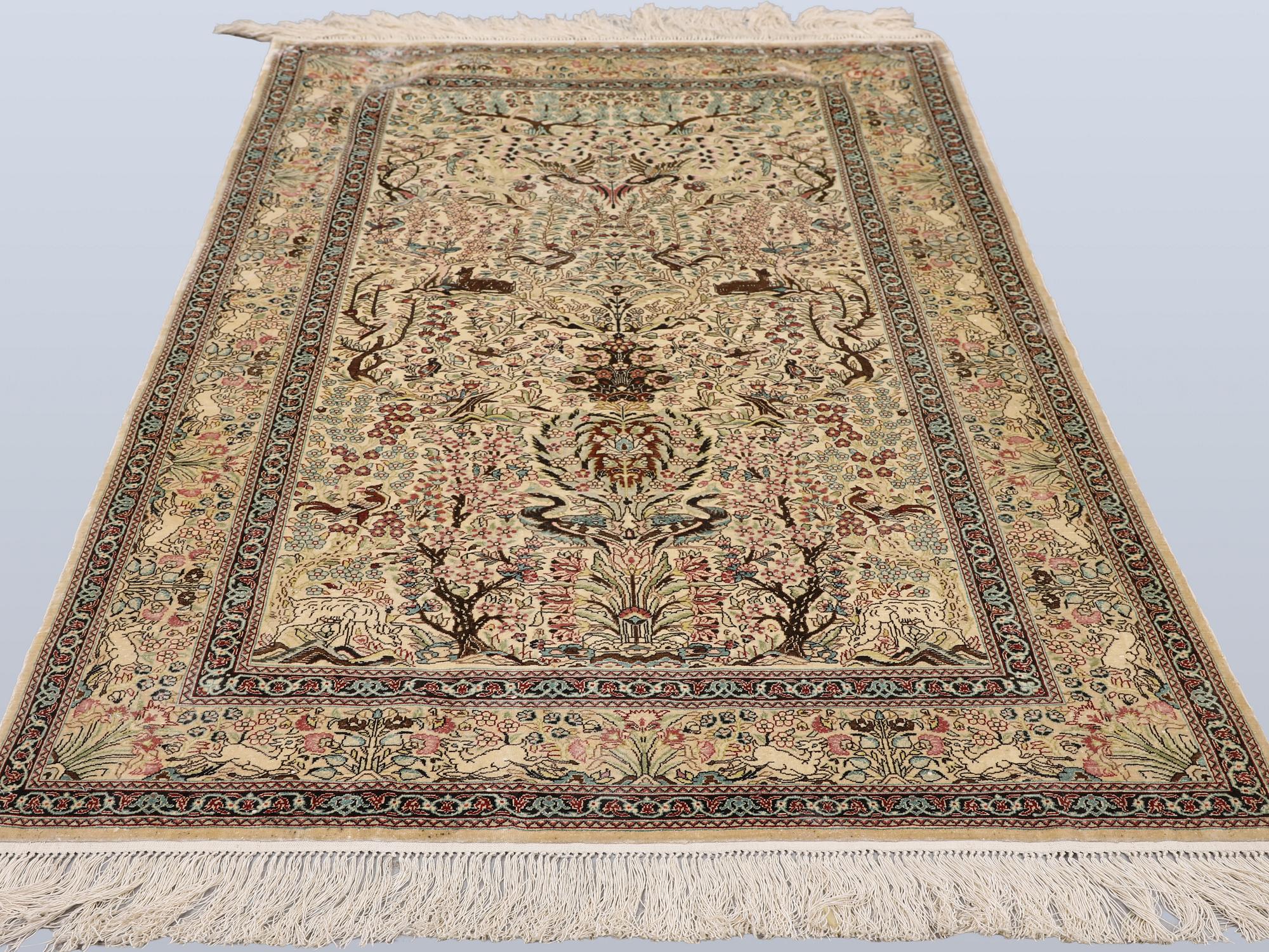 A Oriental silk carpet, 152 x 94 cm.