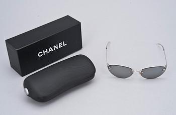 SOLGLASÖGON, Chanel.