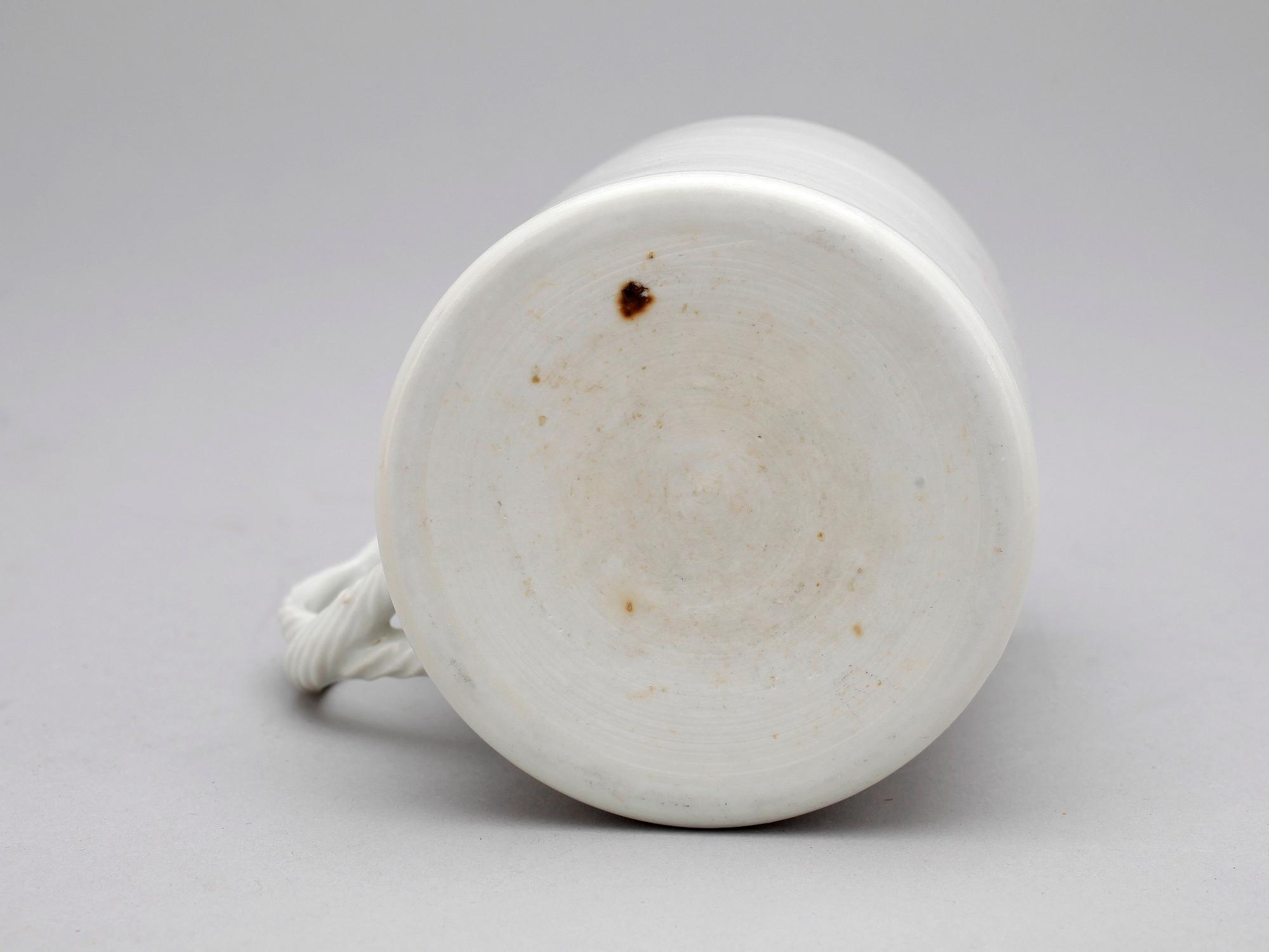 MUGG, porslin, Kina troligen omkring 1800.