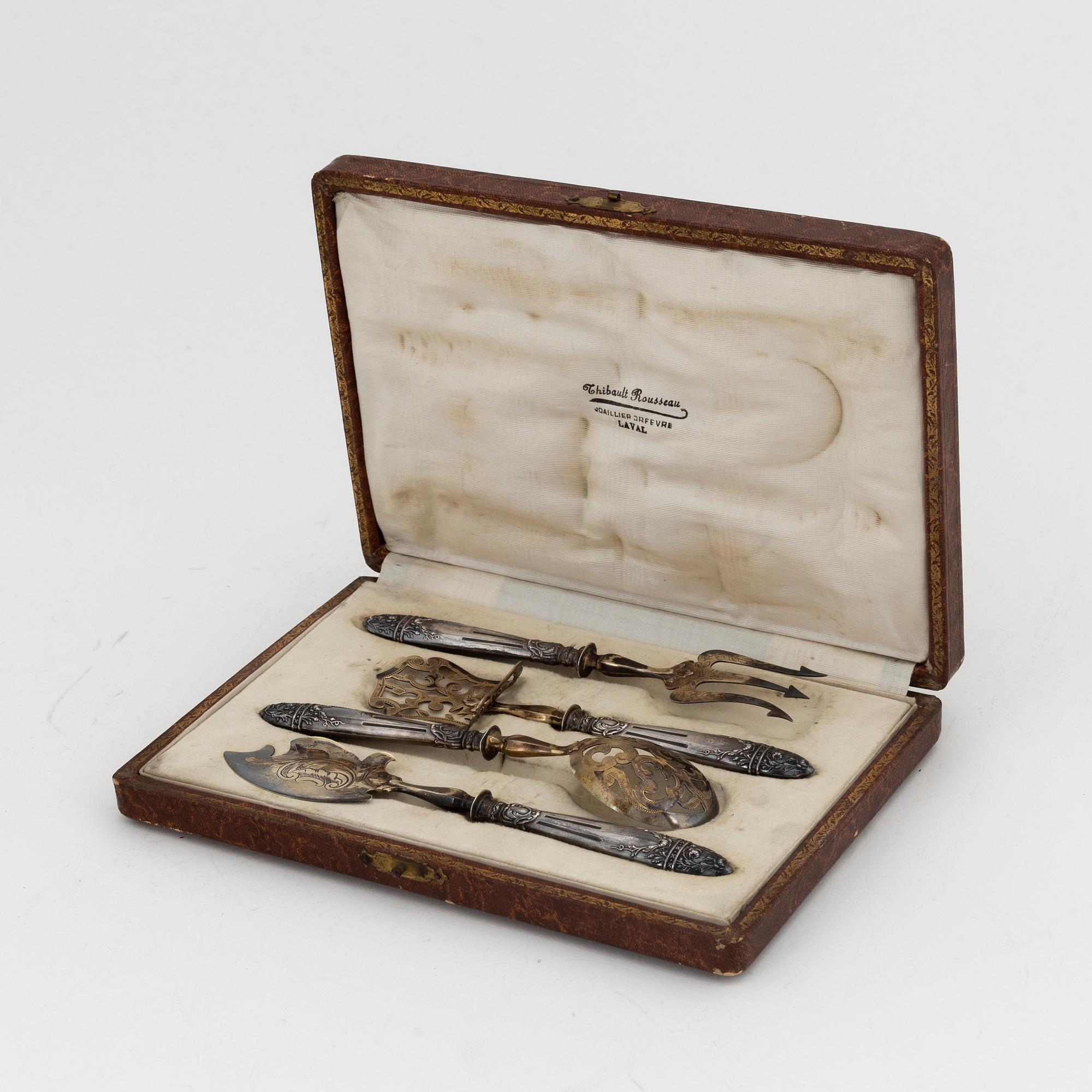 A set of French parcel-gilt silver dessert cutlery, Paris, second half of the 19th century (4 pieces).