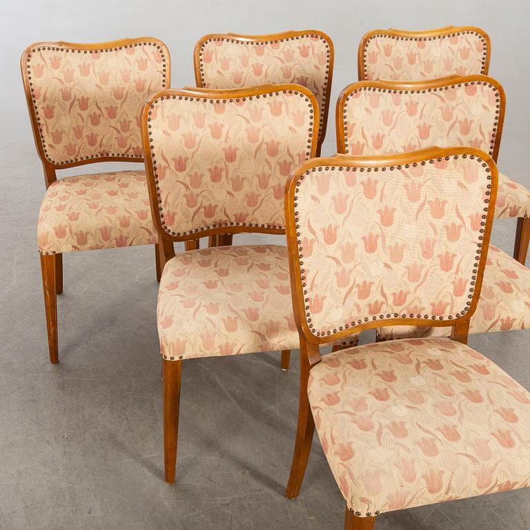 A 1950/60's dining table and chairs.