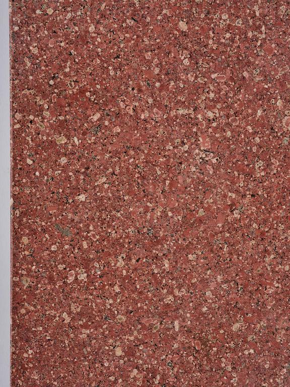 A table with granite stone top from Älvdalen, first part 19th century on a later metal stand.