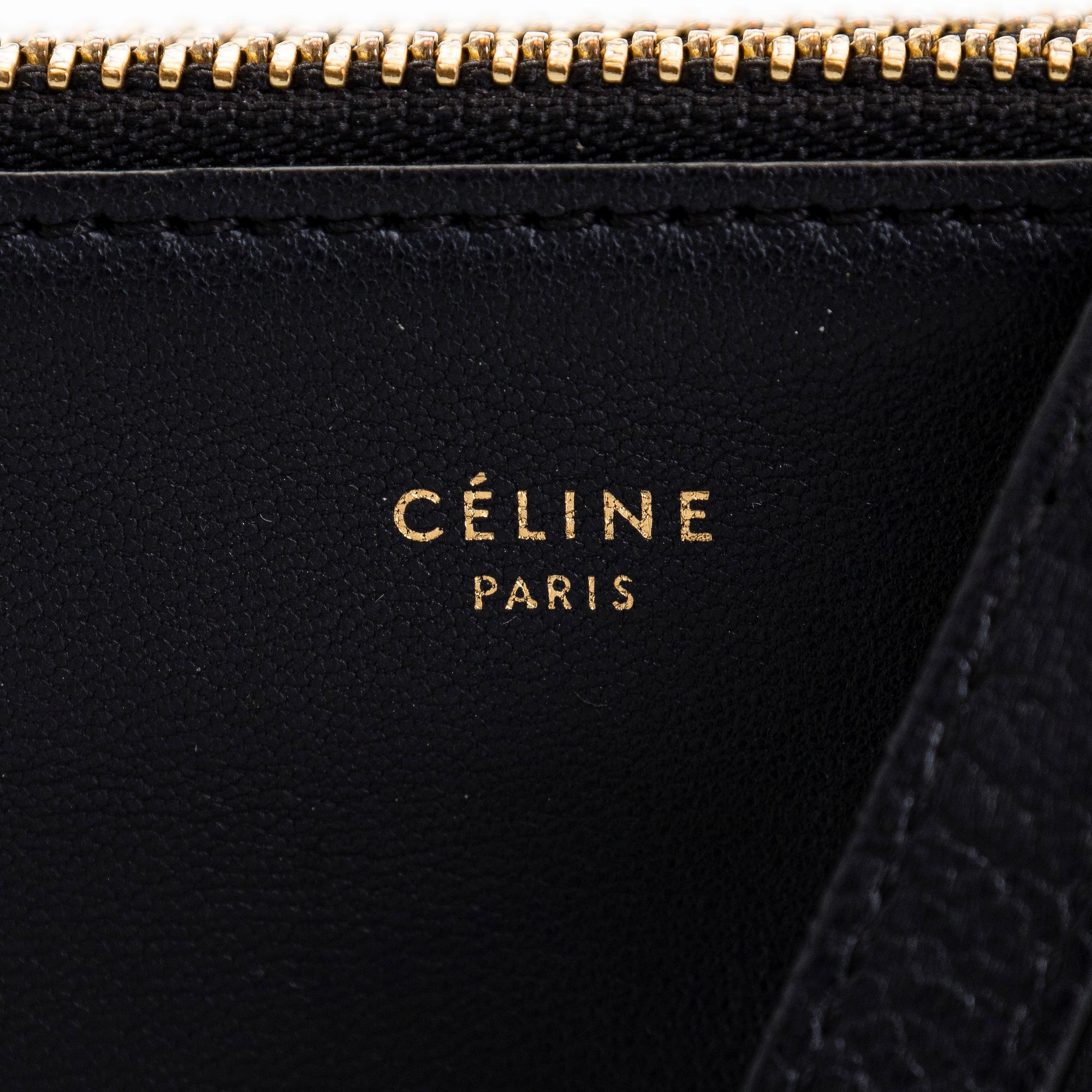 Céline, a black leather 'Trio Small' bag.