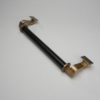 DÖRRHANDTAG, 1900-talets mitt.