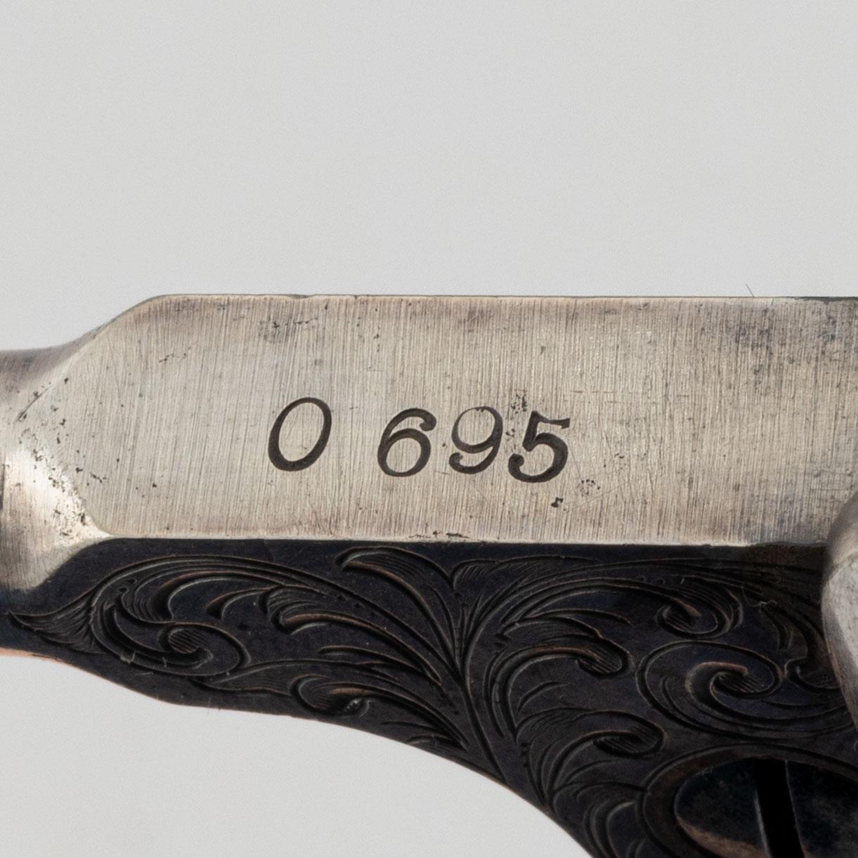 A percussion revolver, Colt 1851 Navy, in case, from the year 1863.