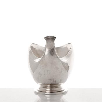 Georg Jensen, a sterling silver sauceboat and ladle, Copenhagen 1925-1945, design nr 98 and 141.