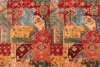 A Kazak carpet, c. 296 x 209 cm.