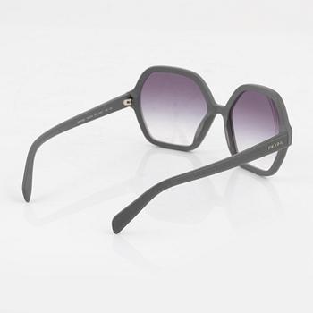 Prada, A pair of grey sunglasses.