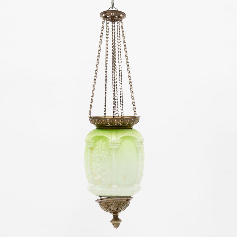 An art noveau glass and brass ceiling lamp from around the year 1900.