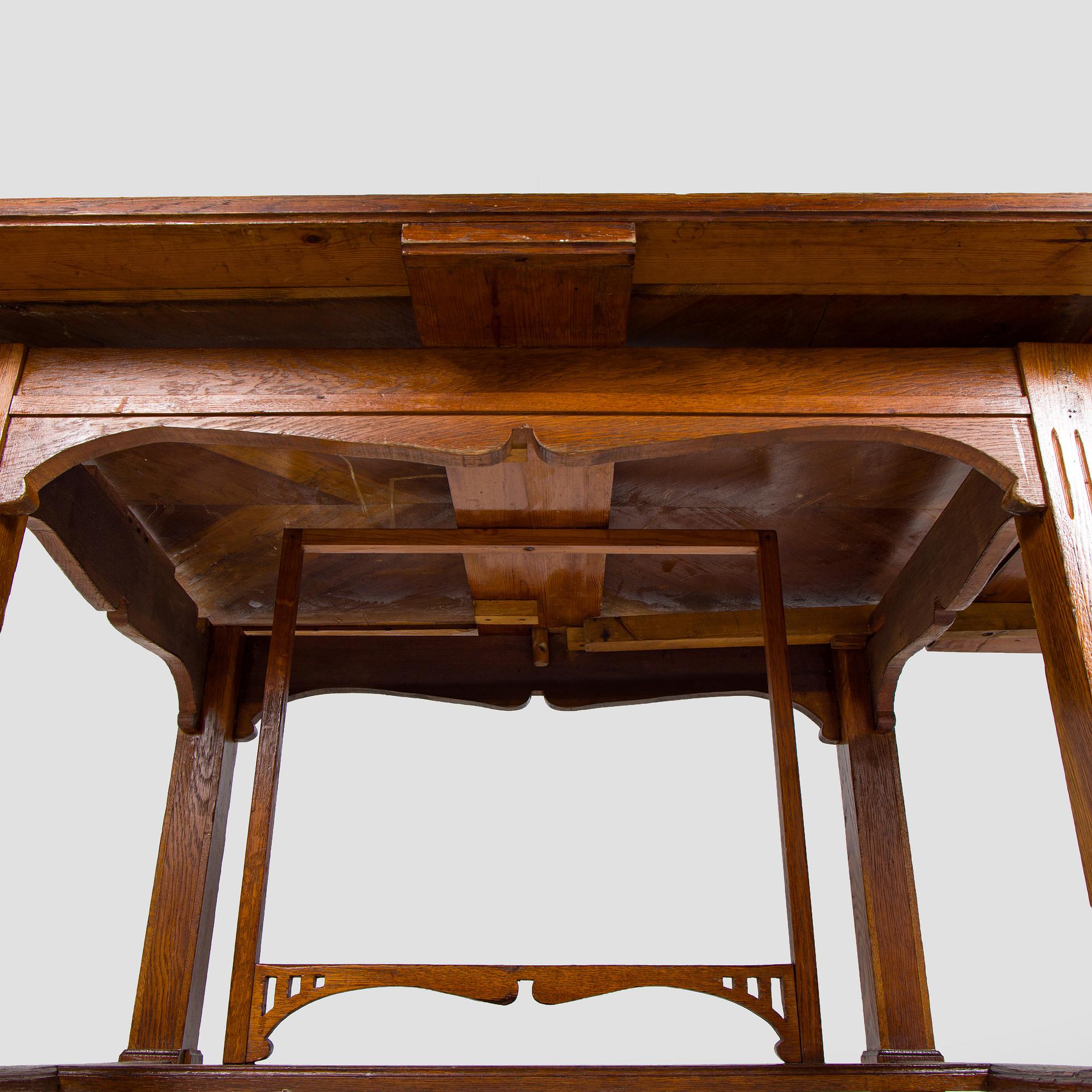 Dining table and six chairs, early 1900.