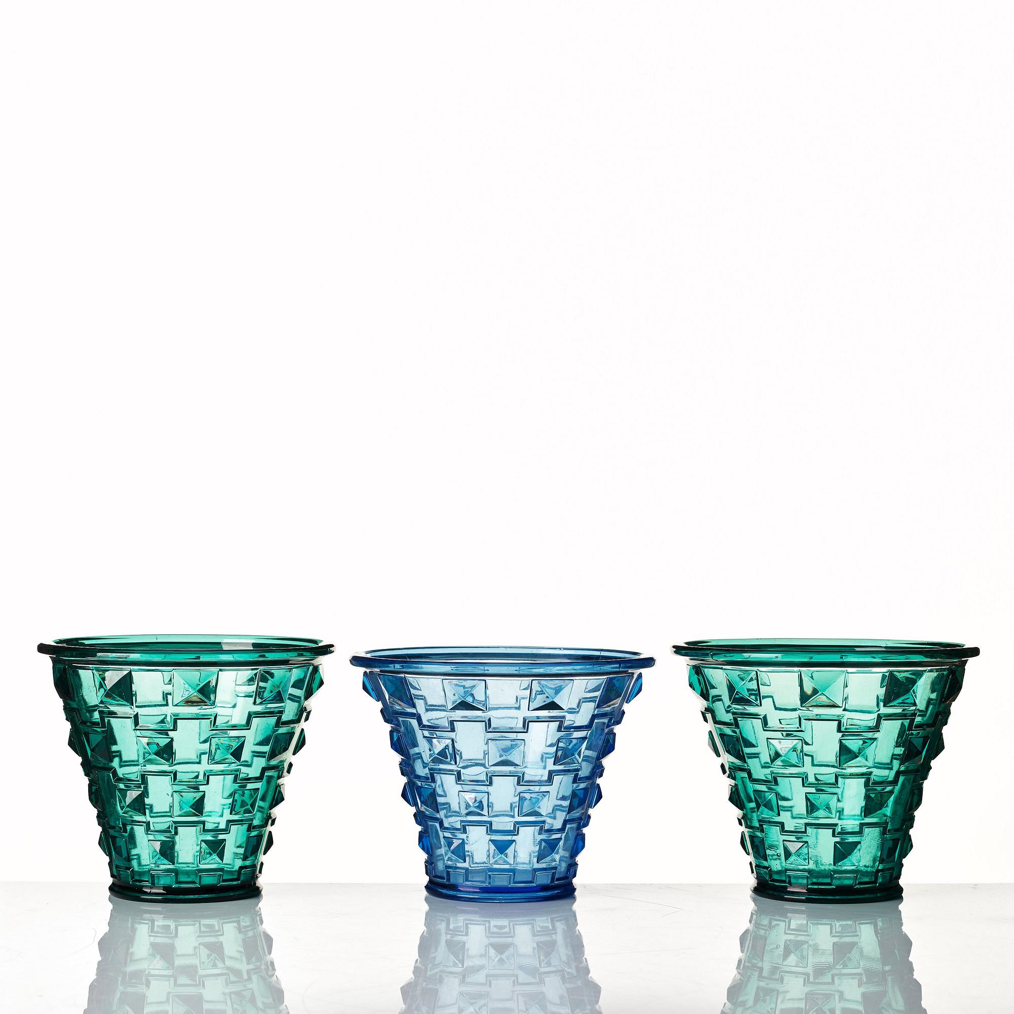 Simon Gate, a set of three pressed glass vases, Orrefors 1930.