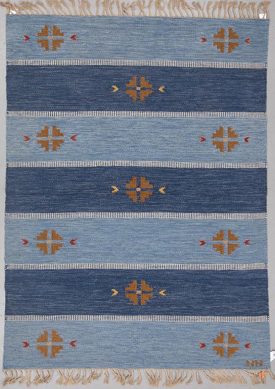 A RUG, "Falsterbo blue", flat weave,  ca 234,5 x 171 cm, it has a signature.