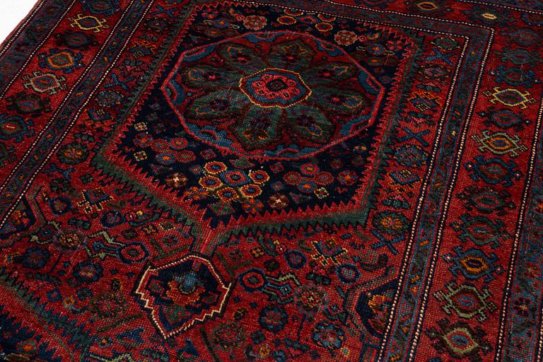 An antique Northwest Persian rug, c. 179 x 143 cm.