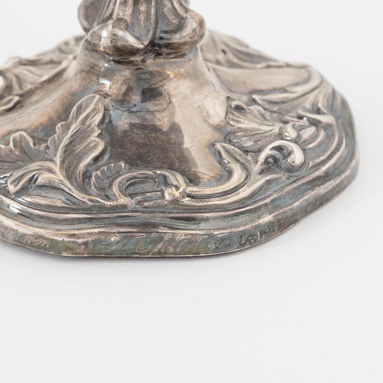 Two pairs of Swedish silver candlesticks, mark of A Lundqvist, Stockholm 1847 and JW Laurén, Stockholm 1854.