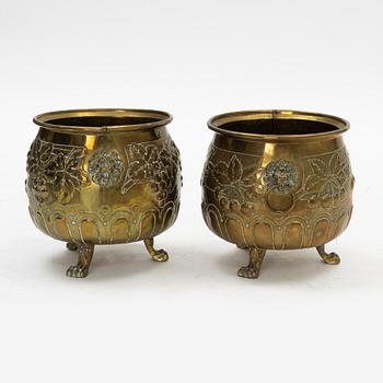 A pair of Baroque style brass plant pots, late 19th Century.