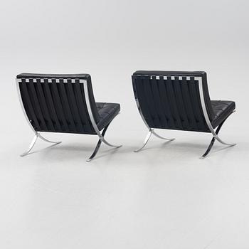 Ludwig Mies van der Rohe, a pair of 'Barcelona' lounge chairs, Knoll.