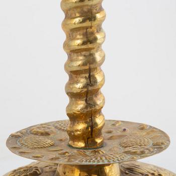 A Swedish repousse-brass baroque candlestick, circa 1700.