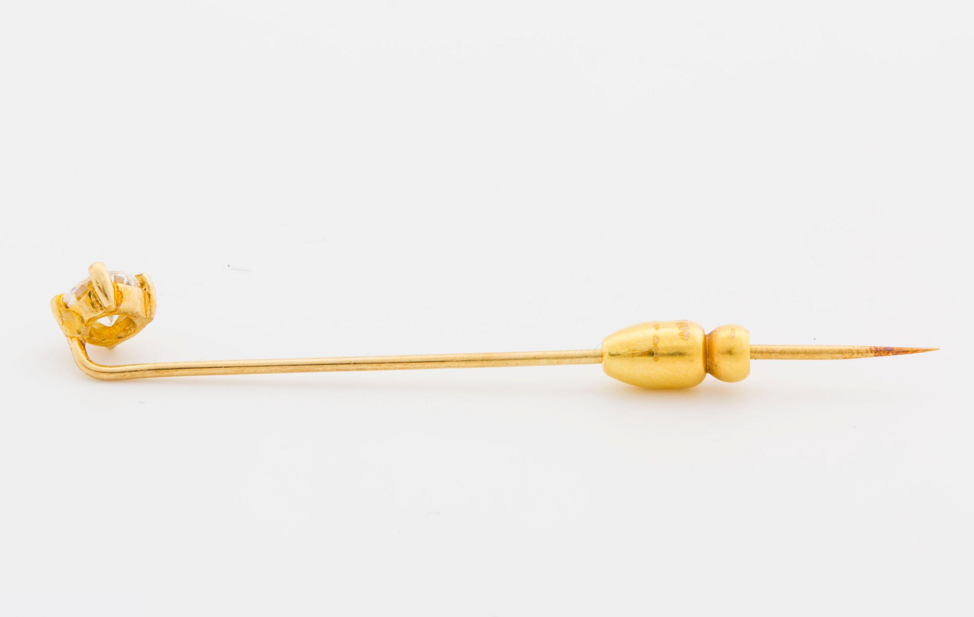 A circa 0.45 ct brilliant-cut diamond pin.