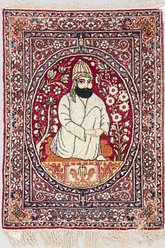 A rug, semi-antique Kerman laver, figural, ca 82 x 59 cm.