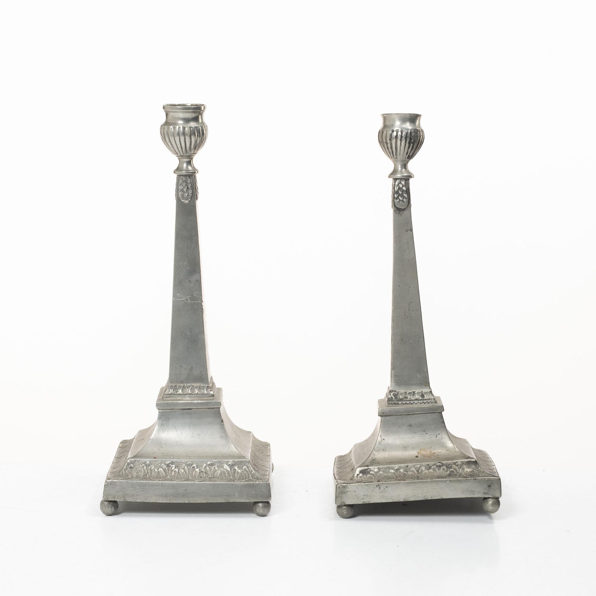 A pair of peuter candlesticks by Petter Höijer, Örebro (1796-1819).