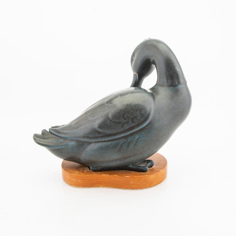 Gunnar Nylund, a signed and numbered 83/200 stoneware figurine.