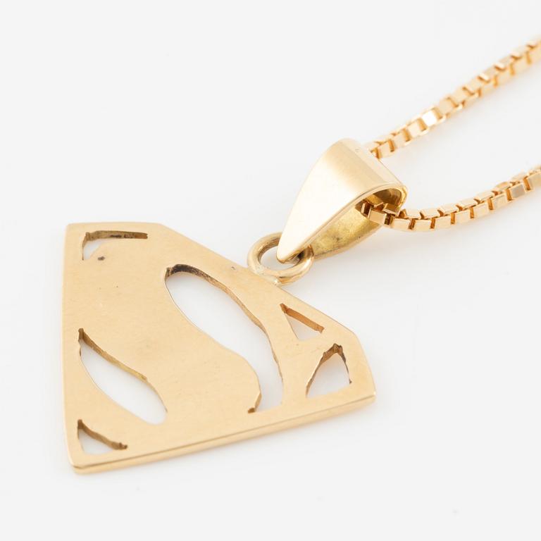 Pendant with chain and a pair of earrings, 18K gold, in the form of Superman/Superwoman logo.
