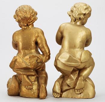 AMORINER, ett par, trä 1700/1800-tal.