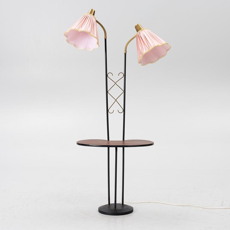 A floor lamp with table, 1940s.