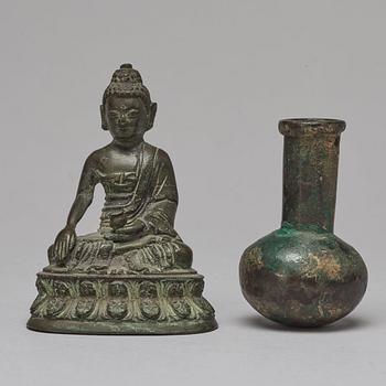 A Tibeto Chinese figure of buddha, 19th Century. A bronze vase, Ming dynasty or older.