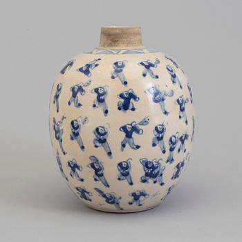 A blue and white porcelain jar, circa 1900.