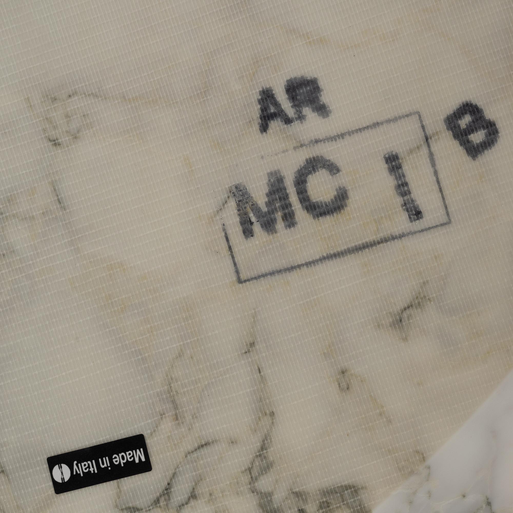 Eero Saarinen, a "Tulip" Arabesco marble top dining table, Knoll.