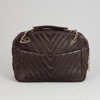 Chanel, a burgundy leather handbag, 1989-91.