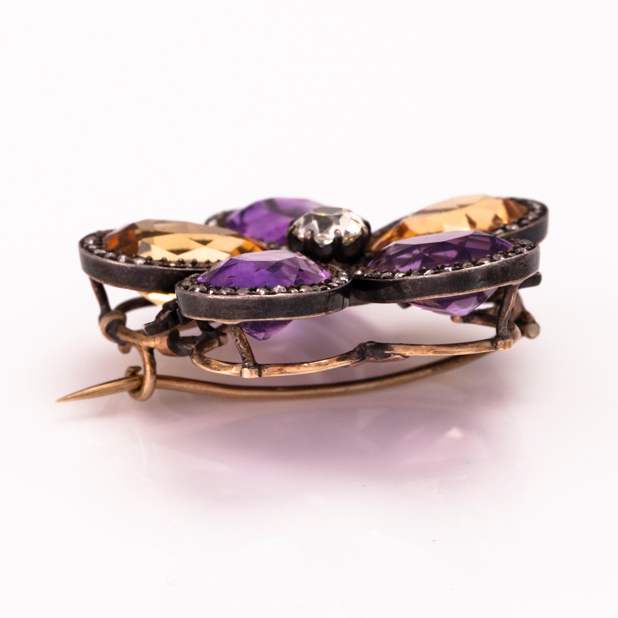 BROSCH, silver, guld, ametister, citriner, gammalslipad briljant ca 0,70 ct samt rosenstenar.