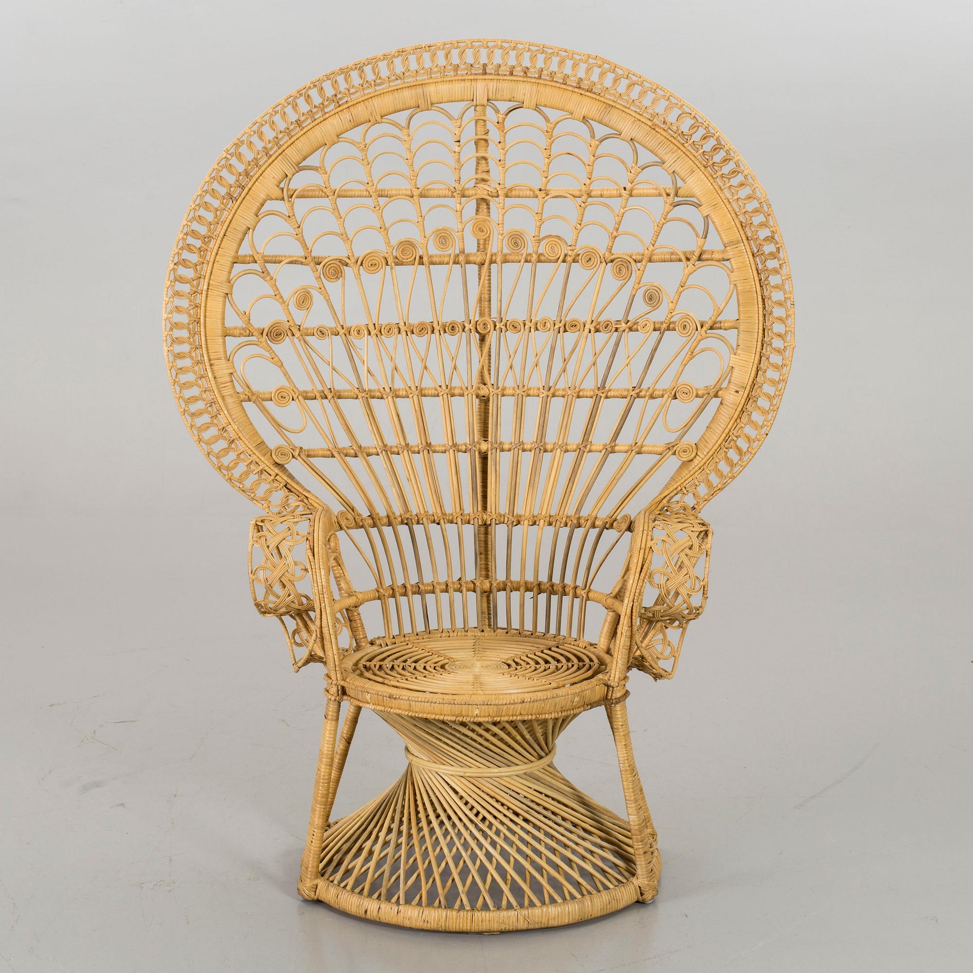 A 20th century wicker chair.
