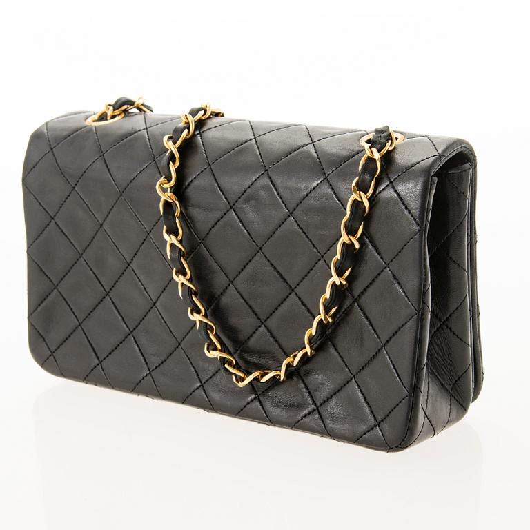 CHANEL Black Lambskin Single Full Flap Bag.