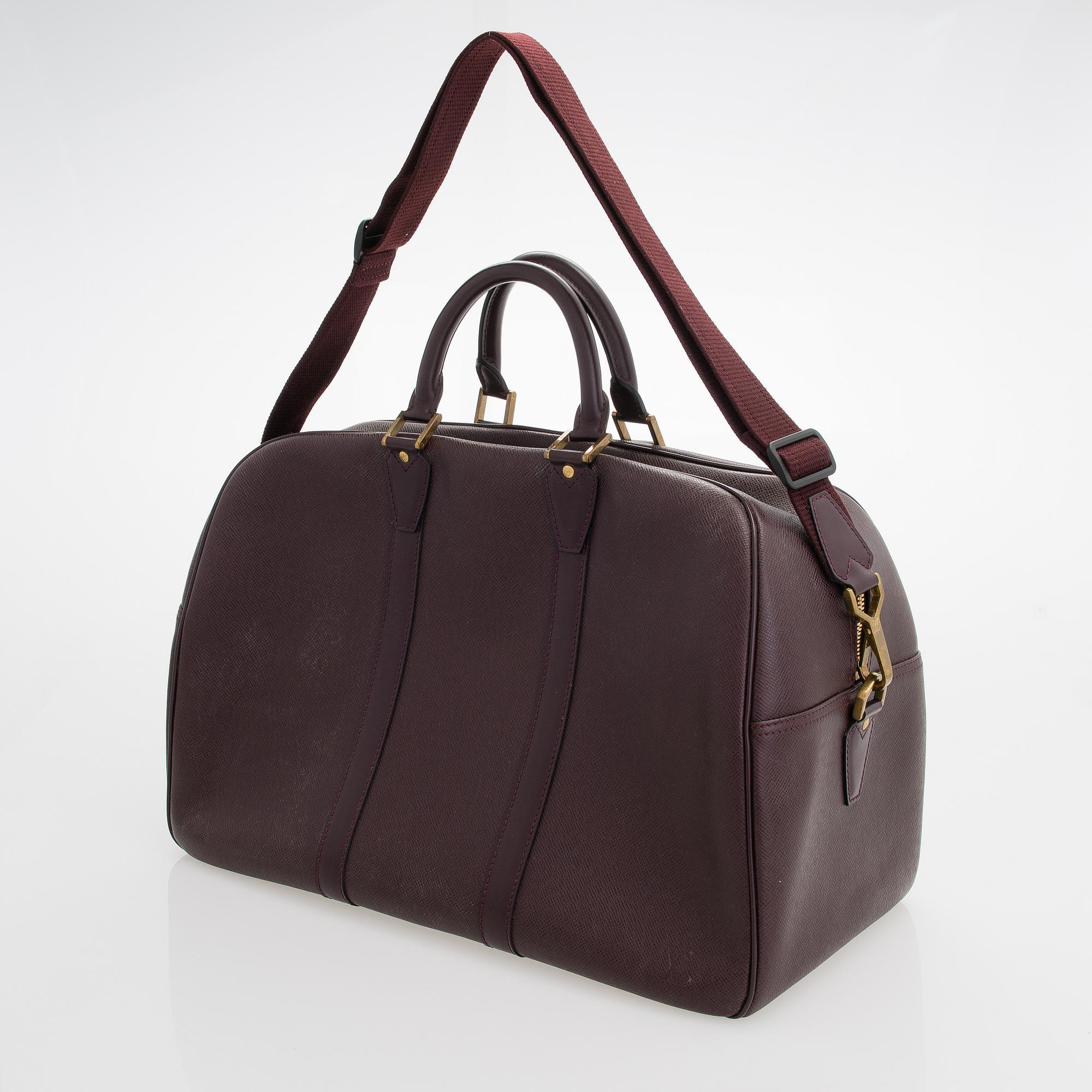 Louis Vuitton, 'Taiga Kendall PM' Bag.